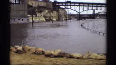 Saint Paul Minnesota (1969): Sacks Are Blocking The Water Looking At The High