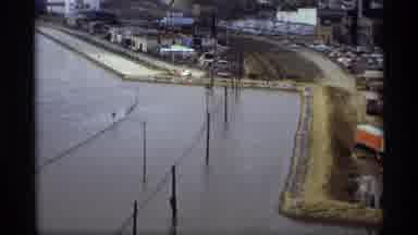 Saint Paul Minnesota (1969): Two People Slowly Walking Along The Top Of A Levee