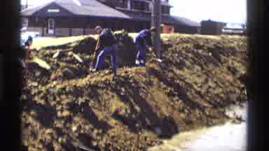 Savage Minnesota (1969): Workers Carrying Out Tasks On A Job Site With Some Heavy