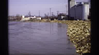 Savage Minnesota (1969): Water Flowing Freely From Underneath A Bridge Down A Long