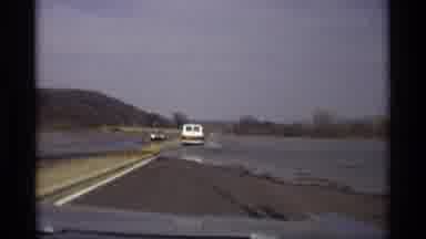 Savage Minnesota (1969): Approaching View Of A Flooded Street On A Sunny Day