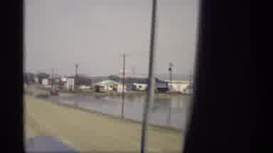 Savage Minnesota (1969): Driving A Car Close To A River And A Bridge Ahead