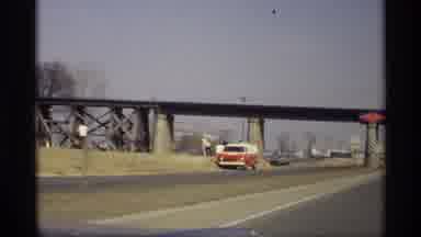 Savage Minnesota (1969): A Red And White Van Pulled Off The Road Filmed By A