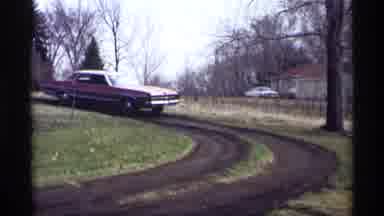 Savage Minnesota (1969): Car Comes Down Driveway Slowly While Taking A Sharp Turn