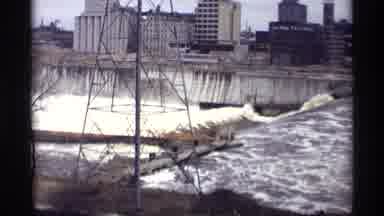 Savage Minnesota (1969): Water Flowing Downstream At A Plant With Large Buildings