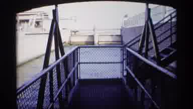 Wisconsin (1969): Water Flows Down A Concrete Canal Followed By A Lighthouse