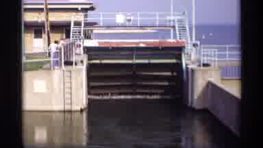Wisconsin (1969): A Sluice Opens While People Watch From A Safe Distance