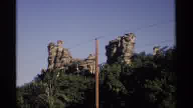 Wisconsin (1969): View Of Black And White Bell Mount Sign On A Bright Sunny Day