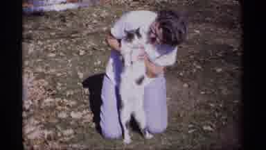 Wisconsin (1969): Woman Cat Lawn Daytime Outdoors Outside Sunny Grass Leaves Day