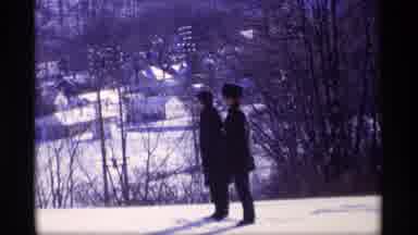 Wisconsin (1969): Cold Snow Day For Two Men Outside Looking Around The Area