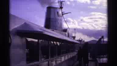 Canada-1974: Smoke Rises From Ship Funnel As People Walk On Deck In Sunny