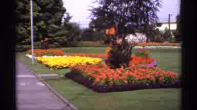 Canada (1974): Flowers Fountain Sunny Landscaped Orange Purple Yellow Green Grass