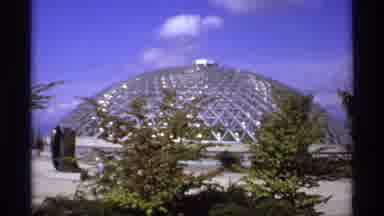 Canada (1974): Geodesic Dome And Water Fountain Feature Outdoors In Some Sort Of