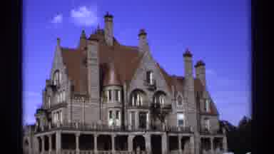 Vancouver Canada (1974): View Of Grey And Brown Building Against Blue Sky On A