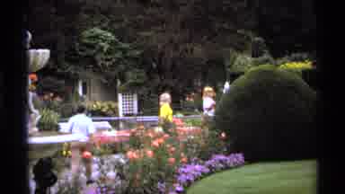 Vancouver Canada (1974): Tourists Enjoy the Spring Blooming Gardens On A Bright