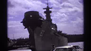 Vancouver Canada (1974): Battleship Anchored In Port With People Walking Past On