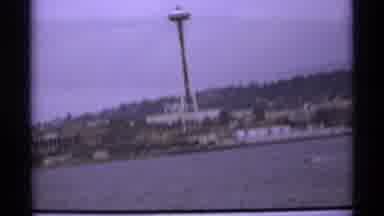 Vancouver Canada (1974): Structure Standing Tall Near A Body Of Water Clouds In