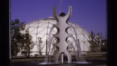 Worlds Fair Seattle (1974): A Fountain In A Park On A Sunny Day And A Butterfly