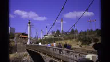 Worlds Fair Seattle-1974: People Walking Across A Footbridge And Children Playing
