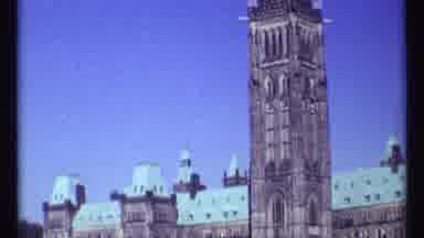 Ottawa Canada (1967): View Of Brown And White Clock Tower Against Blue Sky On A