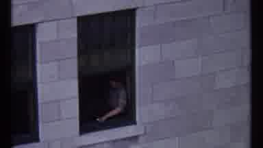 Ottawa Canada (1967): A Man Sitting By A Window And Later An Area With Buildings