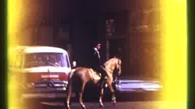 Ottawa Canada (1967): A Man On A Horse On A Busy City Road With Many Cars And A