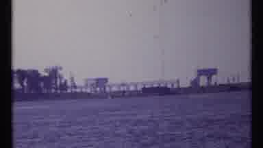 Toronto Canada (1967): Driving A Motorized Boat Past The Bacardi Factory In San
