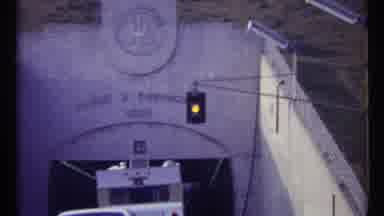 Toronto Canada (1967): Driving In A Tunnel With An Industrial Background Toward An