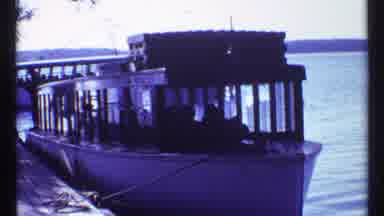 Toronto Canada (1967): Docked Boat While Another Boat Moves In The Background And