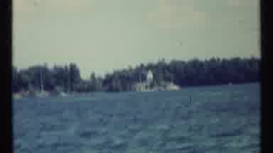 Toronto Canada (1967): A Shaky Still Shot Shows A White Cabin Situated On A Lake