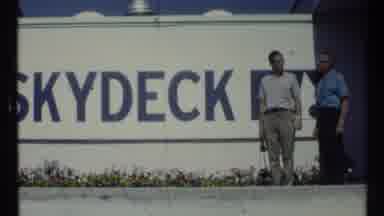 Toronto Canada (1967): Two Men Stand Next To Blue And White Skydeck Sign On A