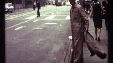 Toronto Canada (1967): Person In White Gloves Directs Traffic As The Bus And Cars
