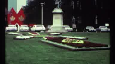Toronto Canada (1967): Parked Cars Near Park With A Lot Of Red Flowers And Bronze