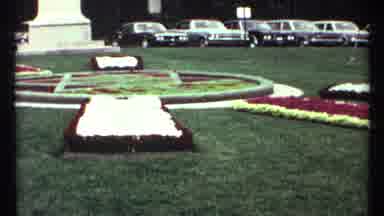 Toronto Canada (1967): Some Beautiful Flowers In A Small Garden Are Looking At A