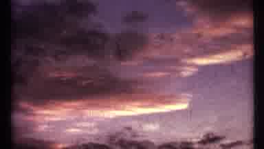 Toronto Canada (1967): View Of Sun Setting Behind Clouds And Tree Silhouettes On