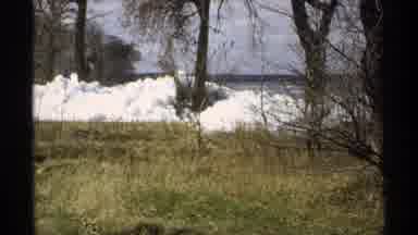 Minnesota (1970): Piles Of Snow Thawing And Melting On The Green Landscape After