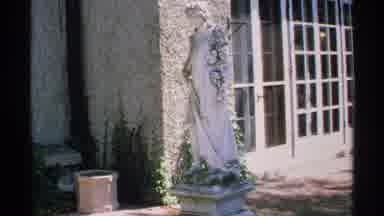 MINNESOTA-1970: Garden With Statue And Heart-Shaped Shutter Cutout