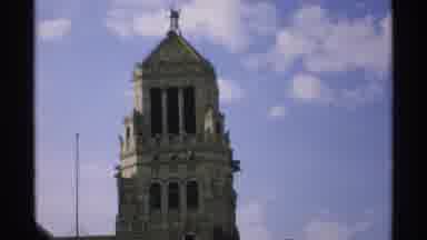 Minnesota (1970): View Of Ivory Tower Against Blue Sky And Person Getting Off