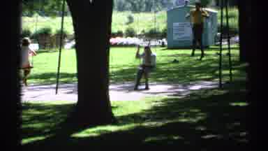 Minnesota (1970): A Small Group Of People Swinging On A Swing-Set