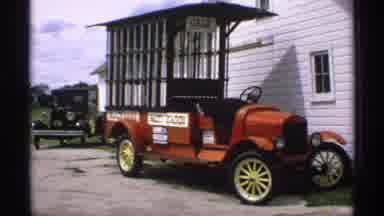Minnesota (1970): Red 70s Roofless Car Parked Outside A Jale