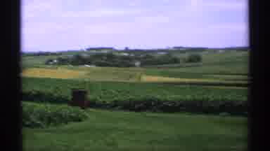 Minnesota (1970): Big Grassy Field Being Filmed With Blue Sky