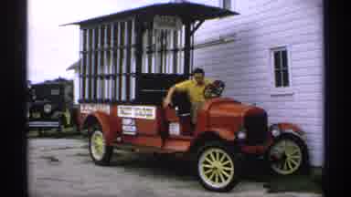 Minnesota (1970): Man In A Yellow Shirt Exiting A Red Vintage Car