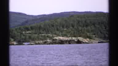 Isle Royale Michigan (1971): Small Island With Trees And Grass With Ocean