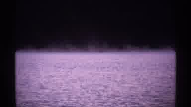Isle Royale Michigan (1971): View Of Small Black Object On Misty Lake Water On A