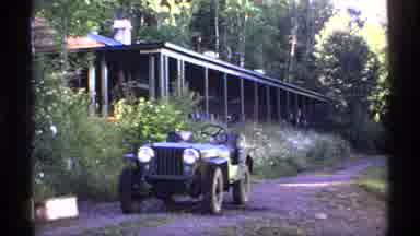 Isle Royale Michigan (1971): A Clean Road With Old Jeep And The Road Side Building