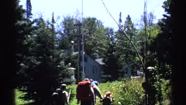 Isle Royale Michigan (1971): Small Group Of People Hiking On Wooded Trail On A