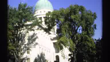 Maine (1971): Camera Captures The White Building With The Green Roof That Hides