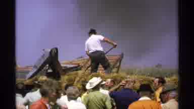 Minnesota (1971): A Man Using The Agriculture Machine And Peoples Are Watching