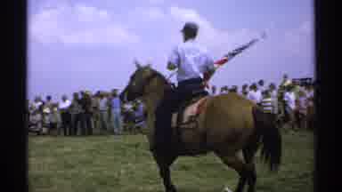 Minnesota (1971): A Horse Rider And The Tractor And Technology With Lot Of People