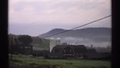 New Hampshire (1971): View Of A Farmhouse And Mountains Surrounding Mountains And
